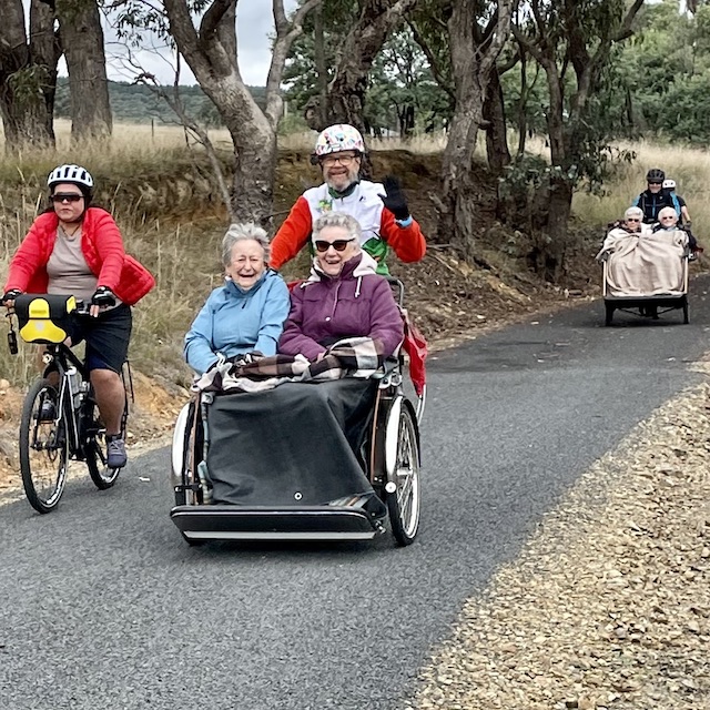 on the trail with cycling without age trikes